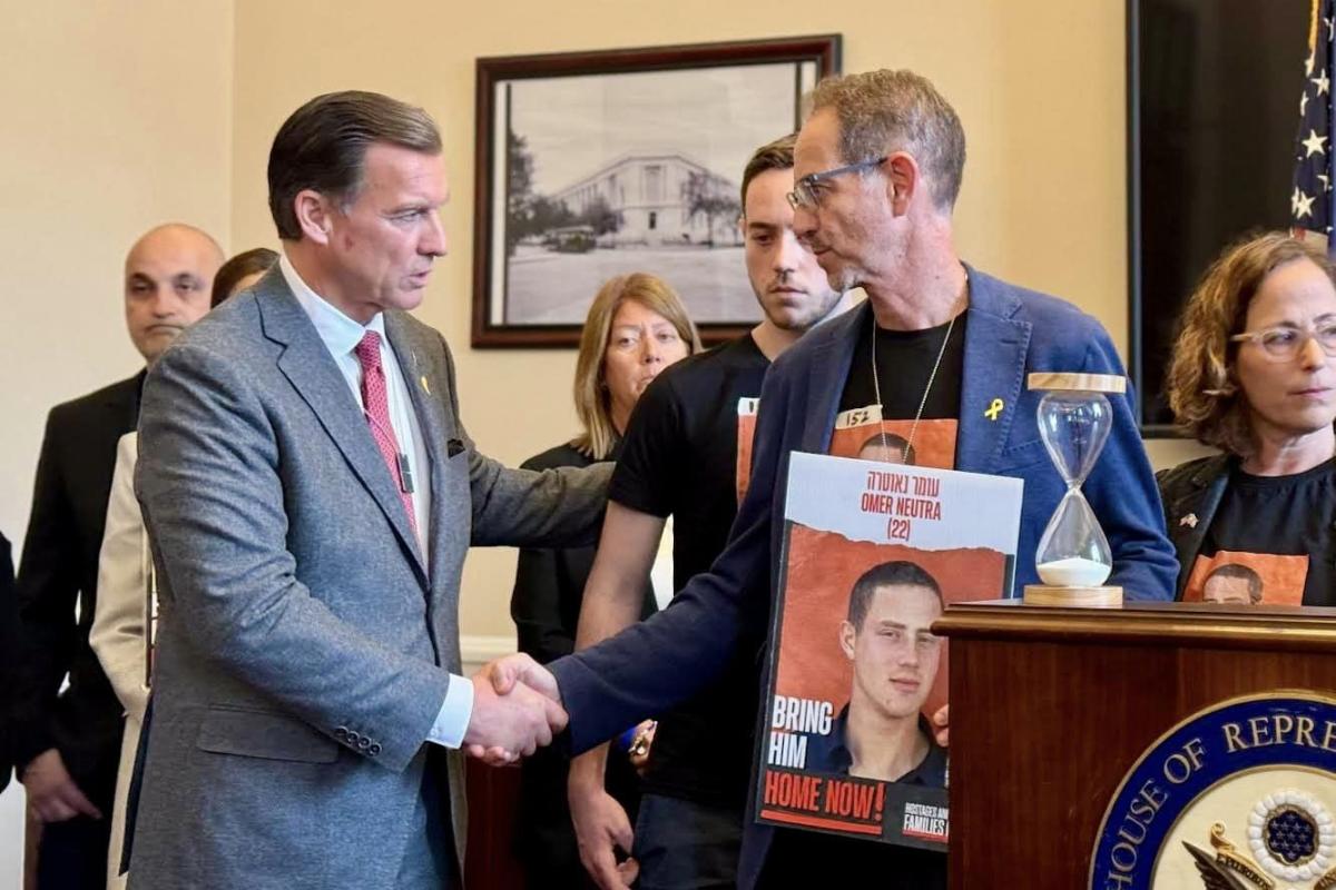 Congressman Tom Suozzi speaking with Ronen Neutra, March 6, 2024