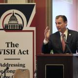 Congressman Tom Suozzi speaks at the WISH Act Conference.